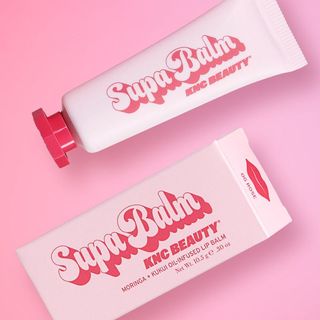 KNC Beauty Supa Lip Balm in a pink tube for Black-owned beauty and skincare brands.