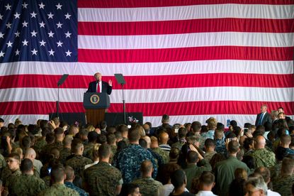 President Trump speaks at a Navy base in Italy