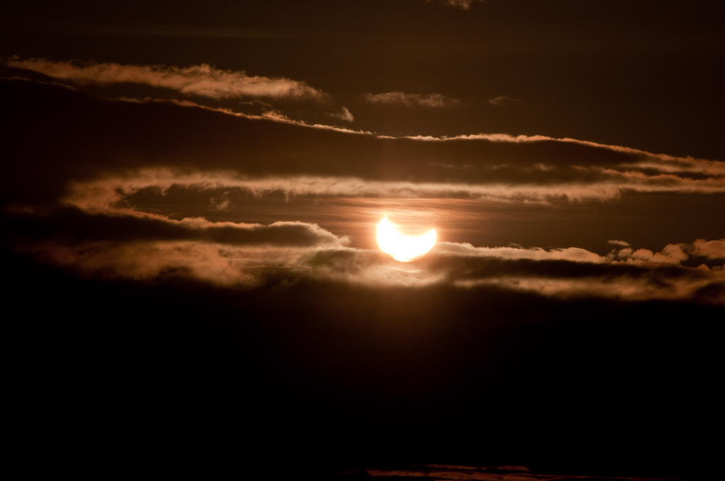 Photographer and skywatcher Bernt Olsen snapped this view of the partial solar eclipse of June 1-2, 2011 just during the "midnight sun" in Tromso, Norway. The partial solar eclipse was dubbed a "midnight" eclipse as its viewing path crossed the International Date Line across far northern latitudes.