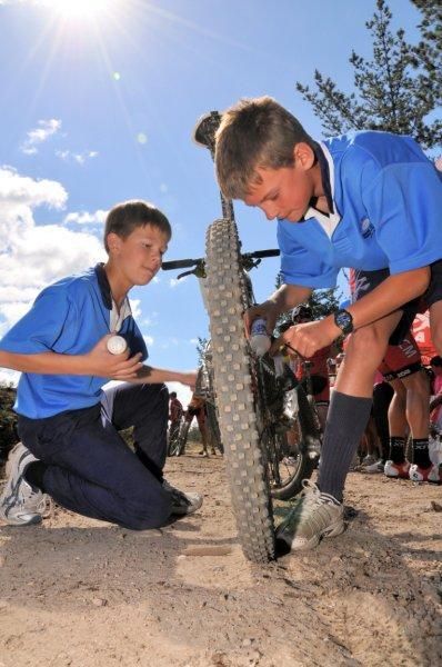 Two Schoolboys give a helping hand at the tech zone