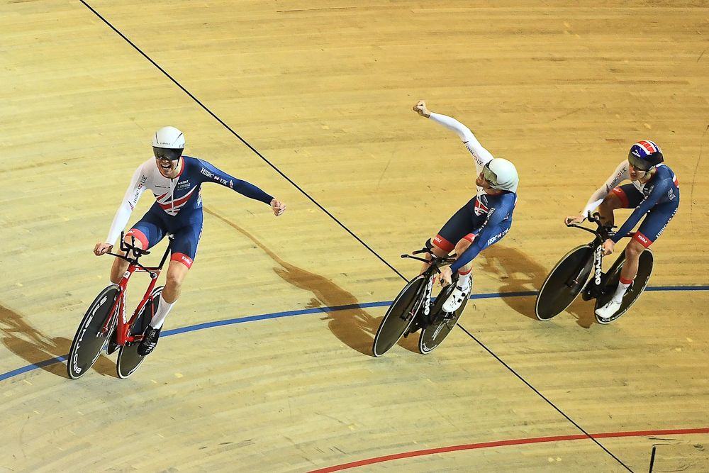 Great Britain's team members celebrate after winning the men's Team Pursuit final during the UCI Track Cycling World Championship