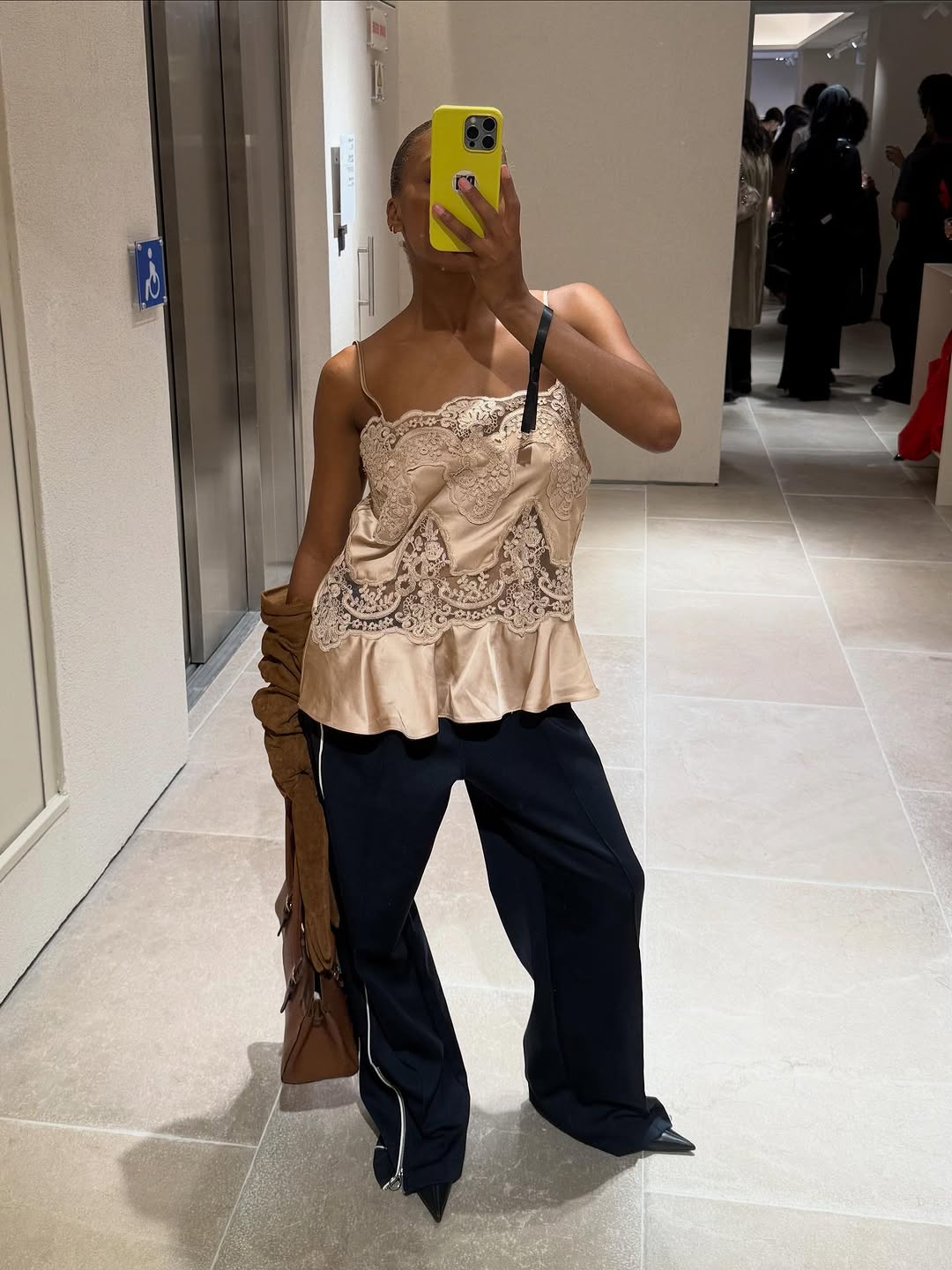 woman wearing fall sweatpant outfit 2025