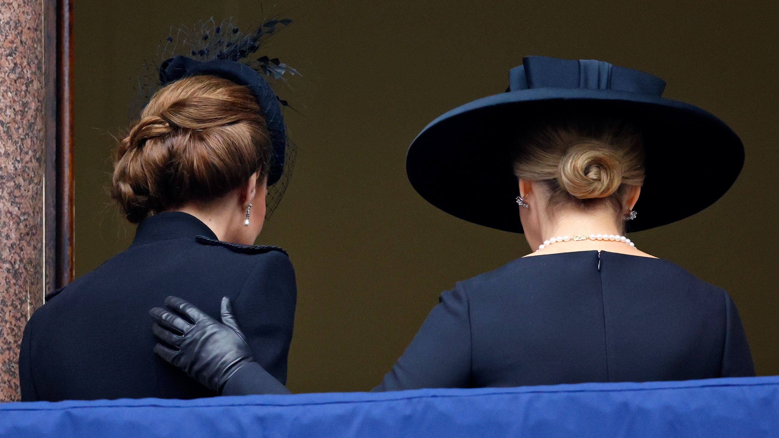 Sophie, Duchess of Edinburgh puts her hand on the back of Catherine, Princess of Wales at the annual National Service of Remembrance at The Cenotaph on November 10, 2024