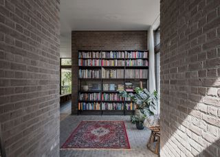 belgian brick bungalow interior with library