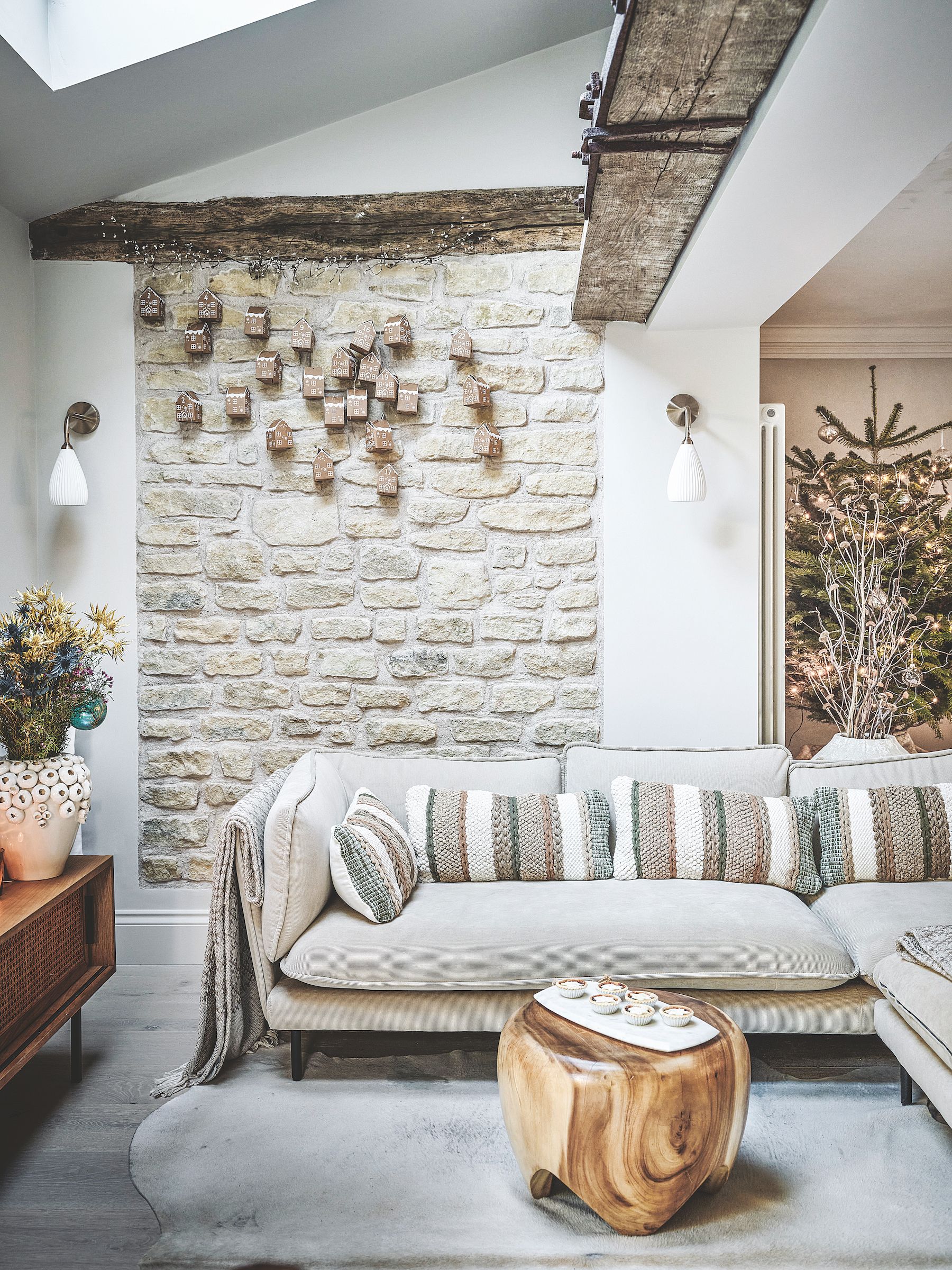 alternative advent calendar hung on exposed stone wall