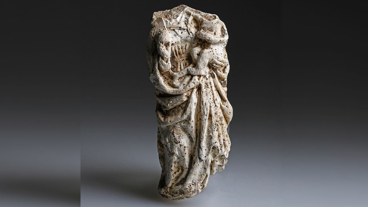 a reliquary of the Virgin Mary missing its head
