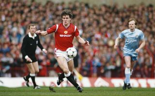 Mark Hughes on the ball for Manchester United against Manchester City in March 1986.