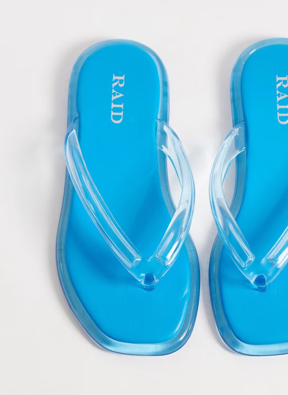 Raid Aziel Jelly Flip Flops in Blue