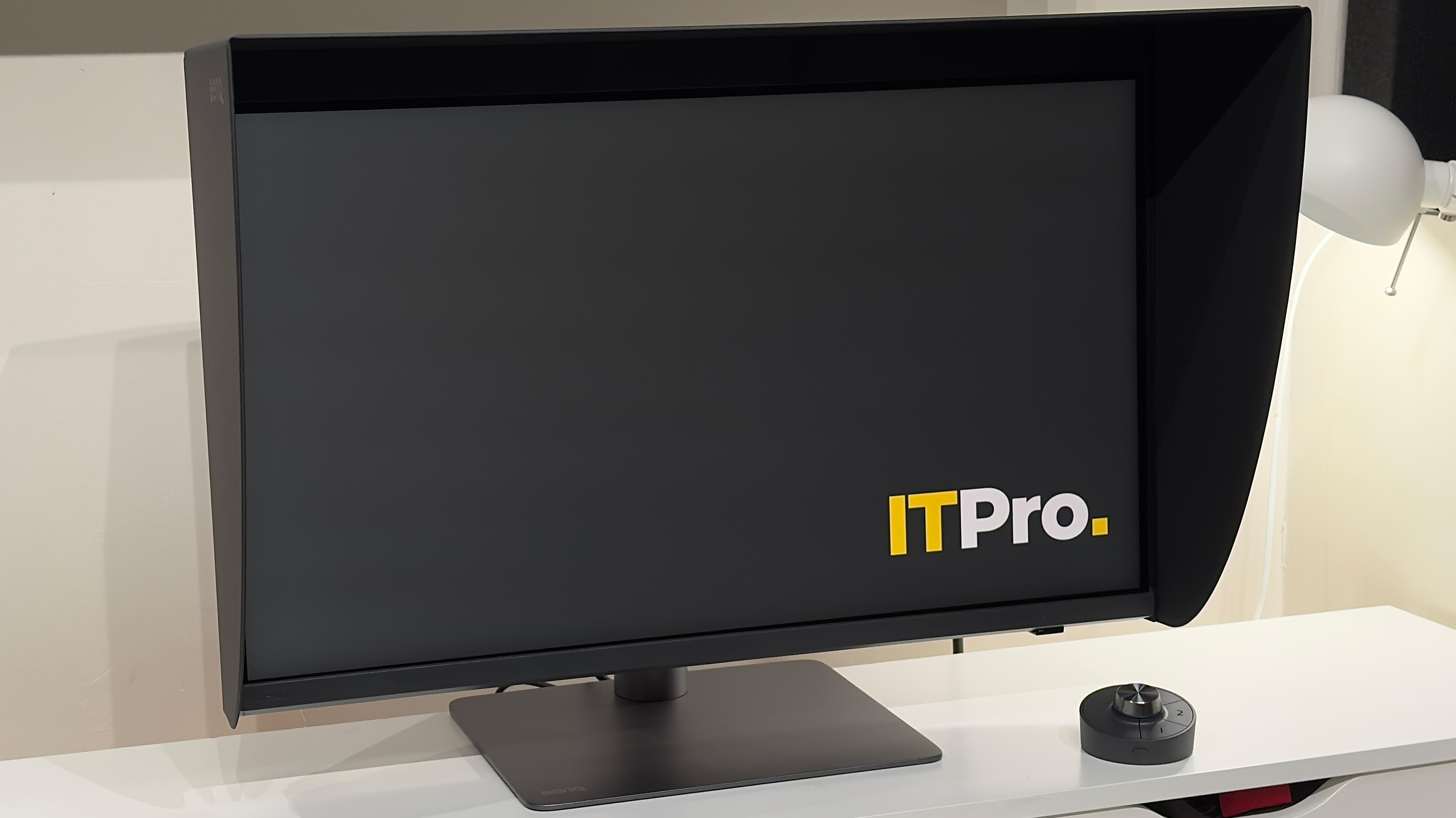 The BenQ PD2770U monitor on a desk