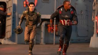 Danny Ramirez and Anthony Mackie run into action on an aircraft carrier in Captain America: Brave New World.