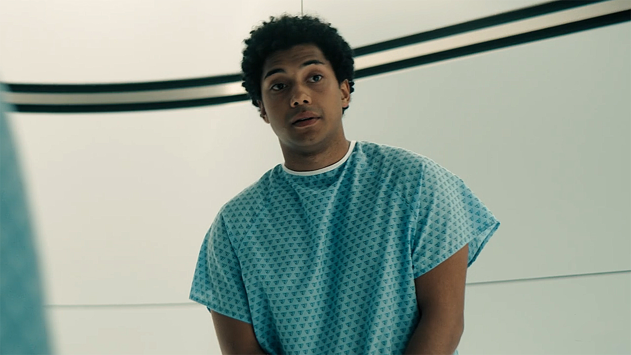 Andre wearing a hospital gown in Gen V season 1 episode 8