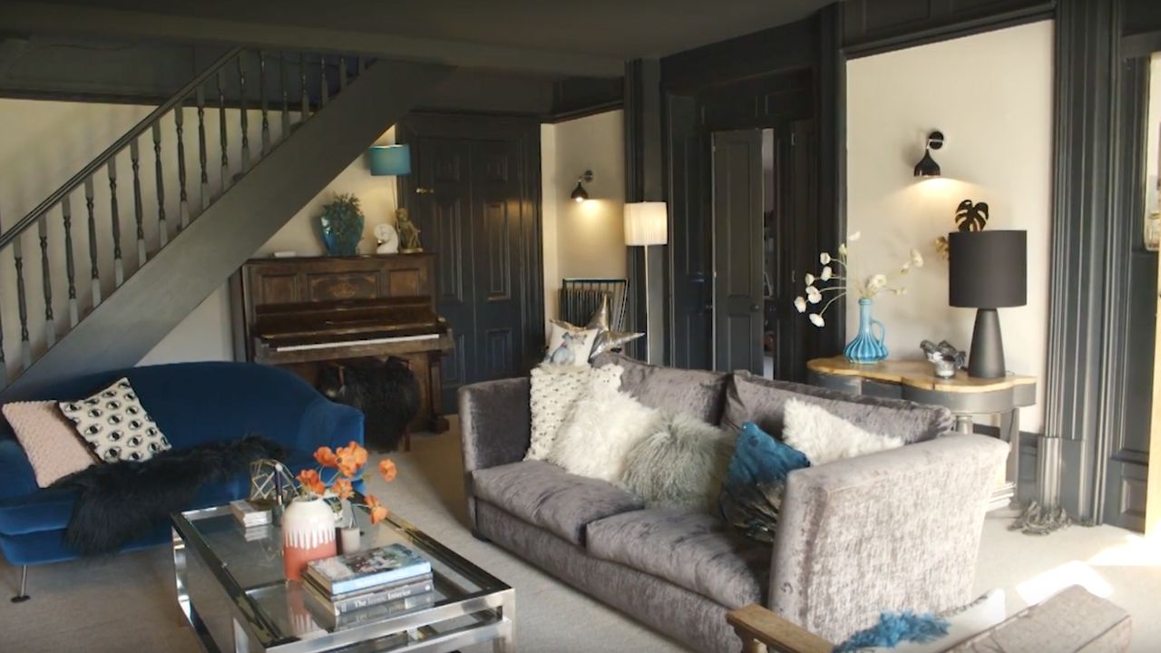 Dark grey living room painted in Railings by Farrow &amp; Ball