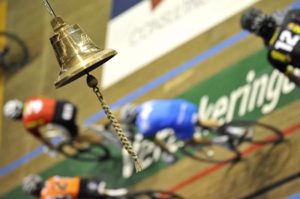 The Gent field race past the bell.