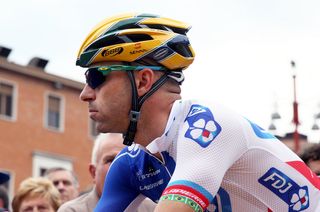 Murilo Fischer (FDJ) wearing a helmet in remembrance of Ayrton Senna as the Giro finished on the Imola F1 circuit on stage 11