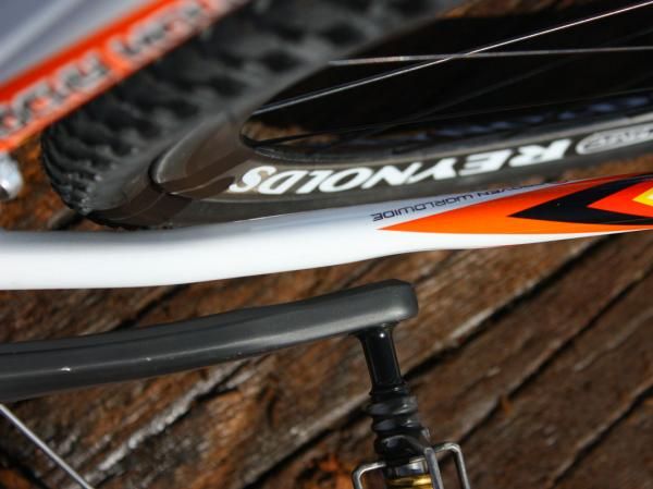 Lateral tire clearance around the chain stays is tight but slight dimples leave more room around the crankarms.
