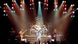 Queen performing onstage in 1976