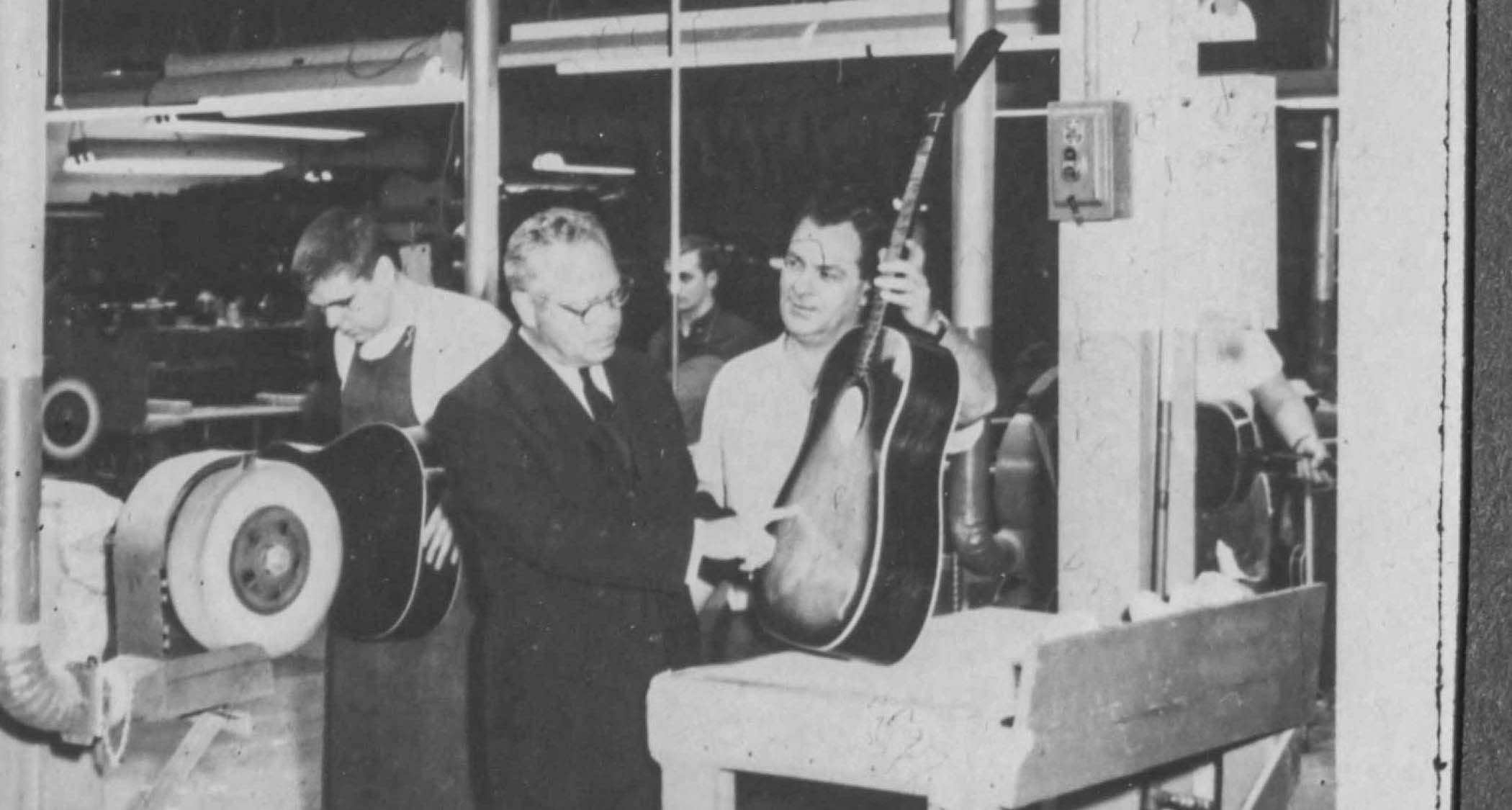 Gibson CEO (in post from 1948 to 1966) Ted McCarty inspects a sunburst spruce top with a critical eye at the Kalamazoo factory.