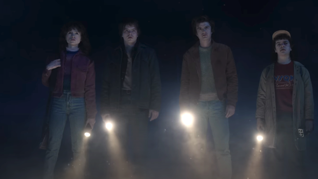 Nancy, Jonathan, Steve and Dustin holding flashlights in stranger things season 5 trailer 