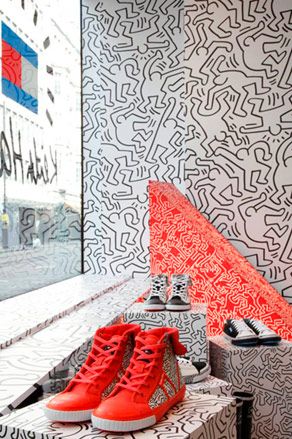 Haring's work also serves as the backdrop for the window installation
