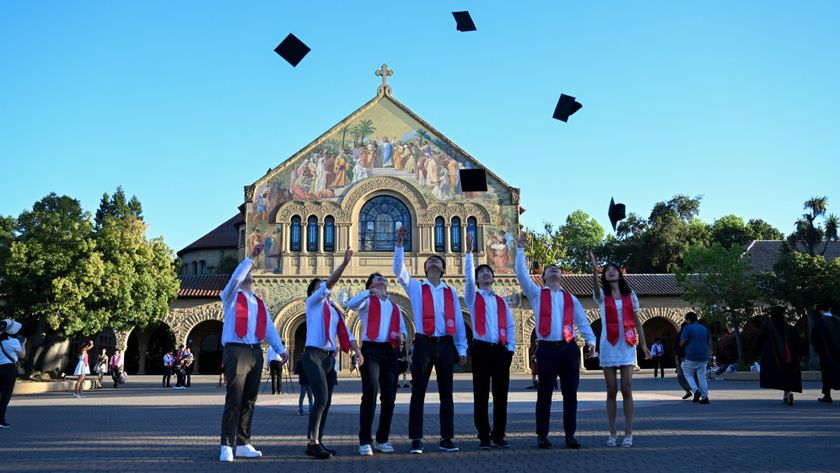 Stanford graduated students get photos taken after graduation ceremony at Stanford University in Stanford, California, United States on June 12, 2024.