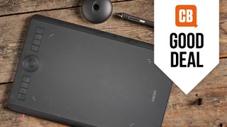 Wacom Intuos Pro Prime Day deal; a black drawing tablet on a wooden table