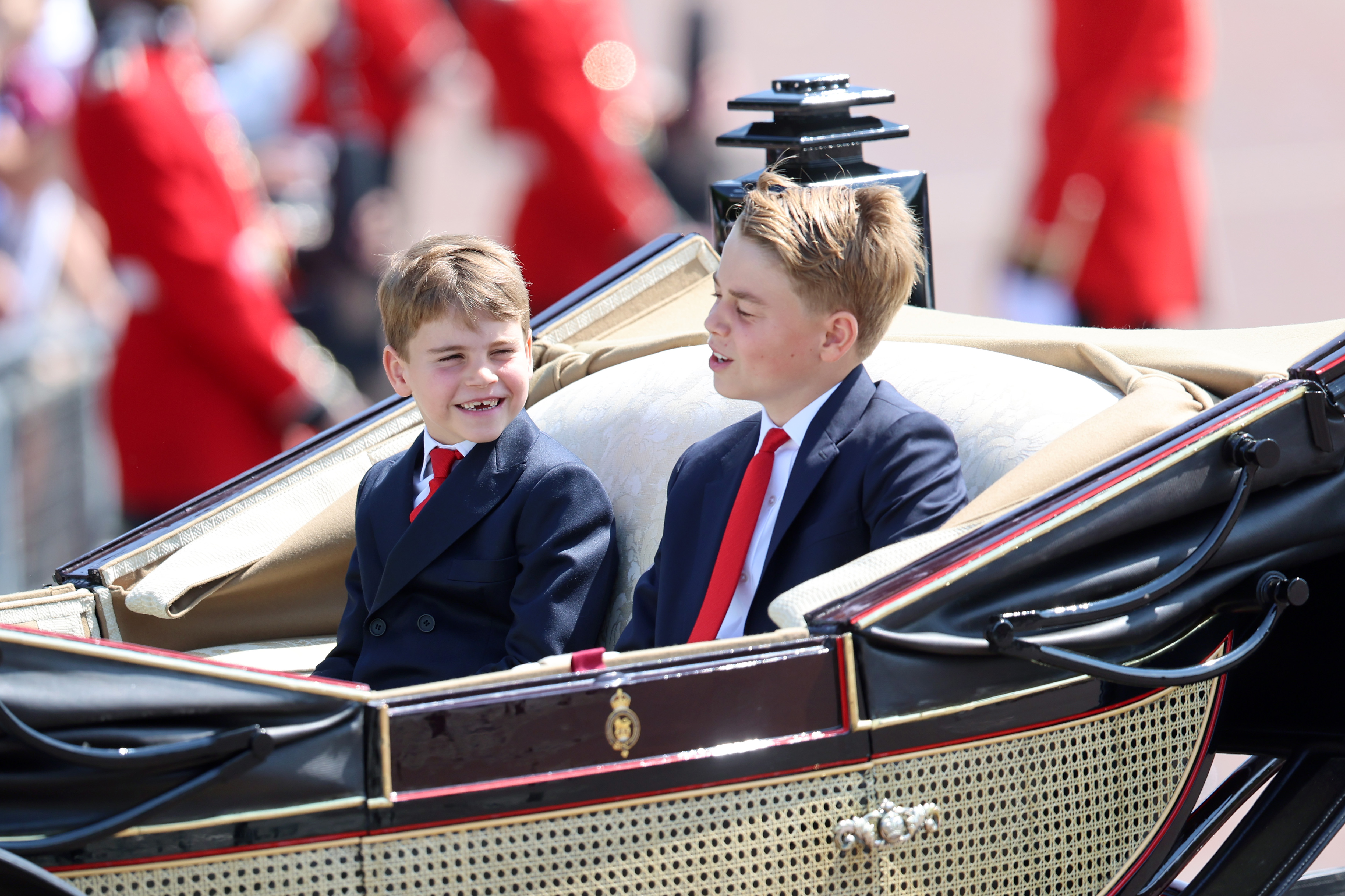 Prince Louis and Prince George laughing in the carriage as they arrive at Trooping the Colour 2025
