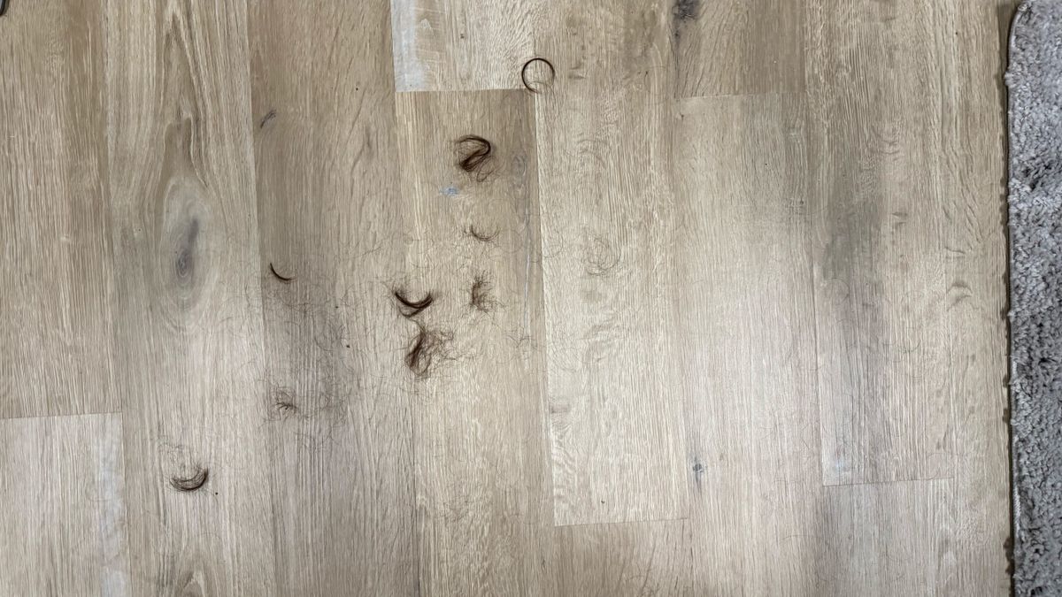 a photograph of hair before and after being cleaned up by the dreame h12 pro
