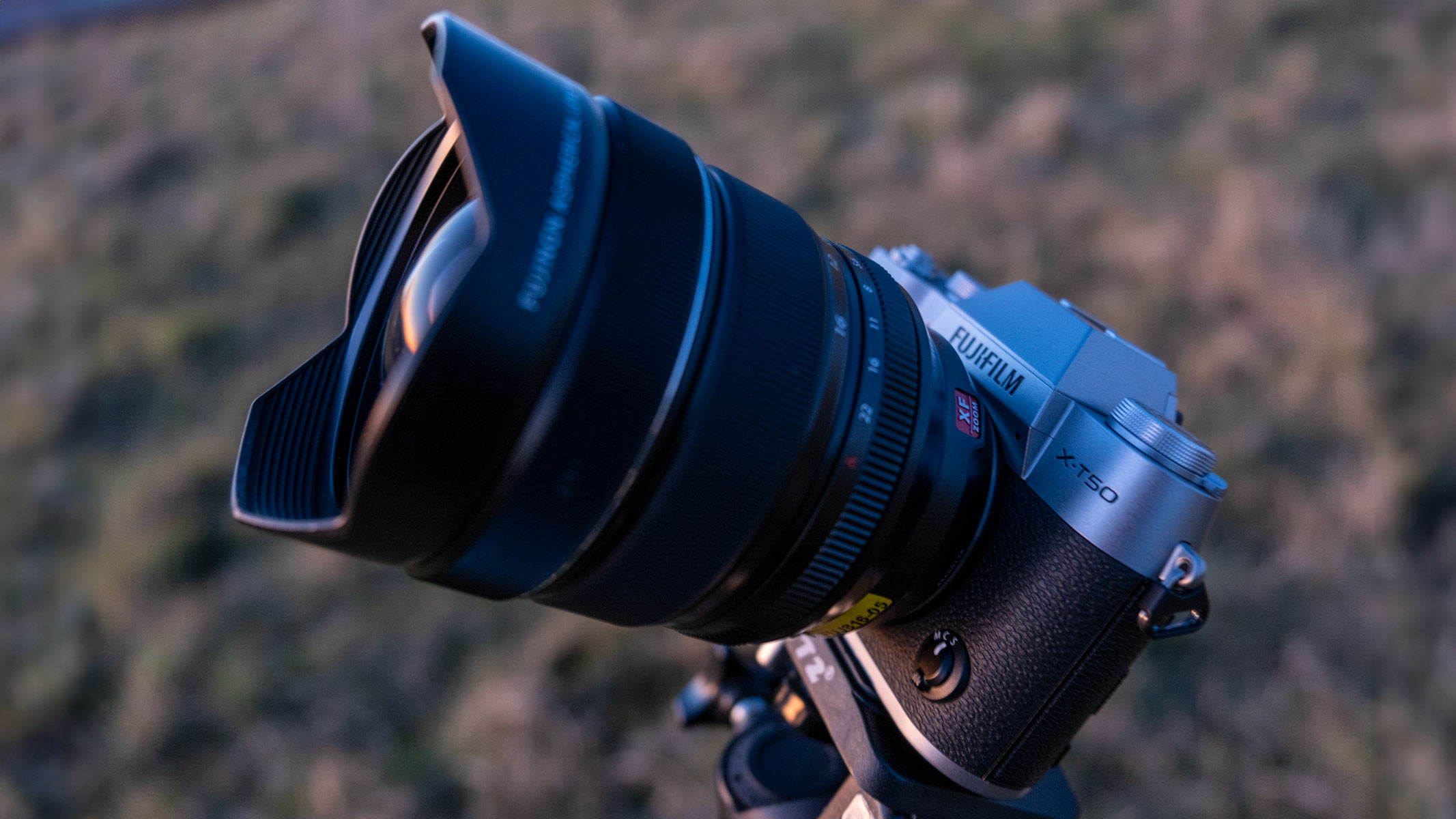 The Fujifilm X-T50 with an XF 8-16mm f/2.8 lens pointing at the sky