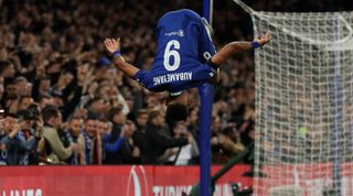 Chelsea striker Pierre-Emerick Aubameyang somersaults in celebration after scoring his team's second goal in the UEFA Champions League match between Chelsea and AC Milan on 5 October, 2022 at Stamford Bridge, London, United Kingdom