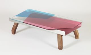 Pink, blue and white coffee table with wooden legs