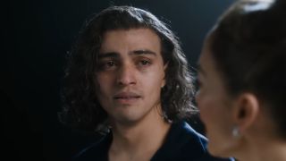 Tonatiuh looking at JLo with tears in his eyes in Kiss of the Spider Woman 