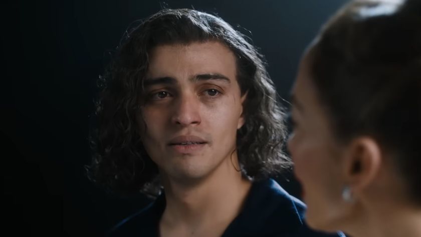 Tonatiuh looking at JLo with tears in his eyes in Kiss of the Spider Woman 