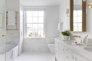 white marble bathroom in period house