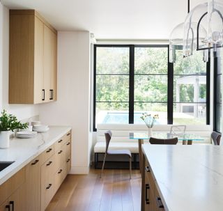 Wood and quartzite kitchen by Kimberly Larzelere