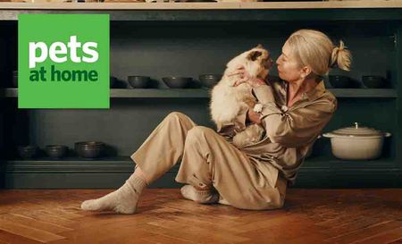 Pets at Home Logo placed over an woman holding a cat to her face