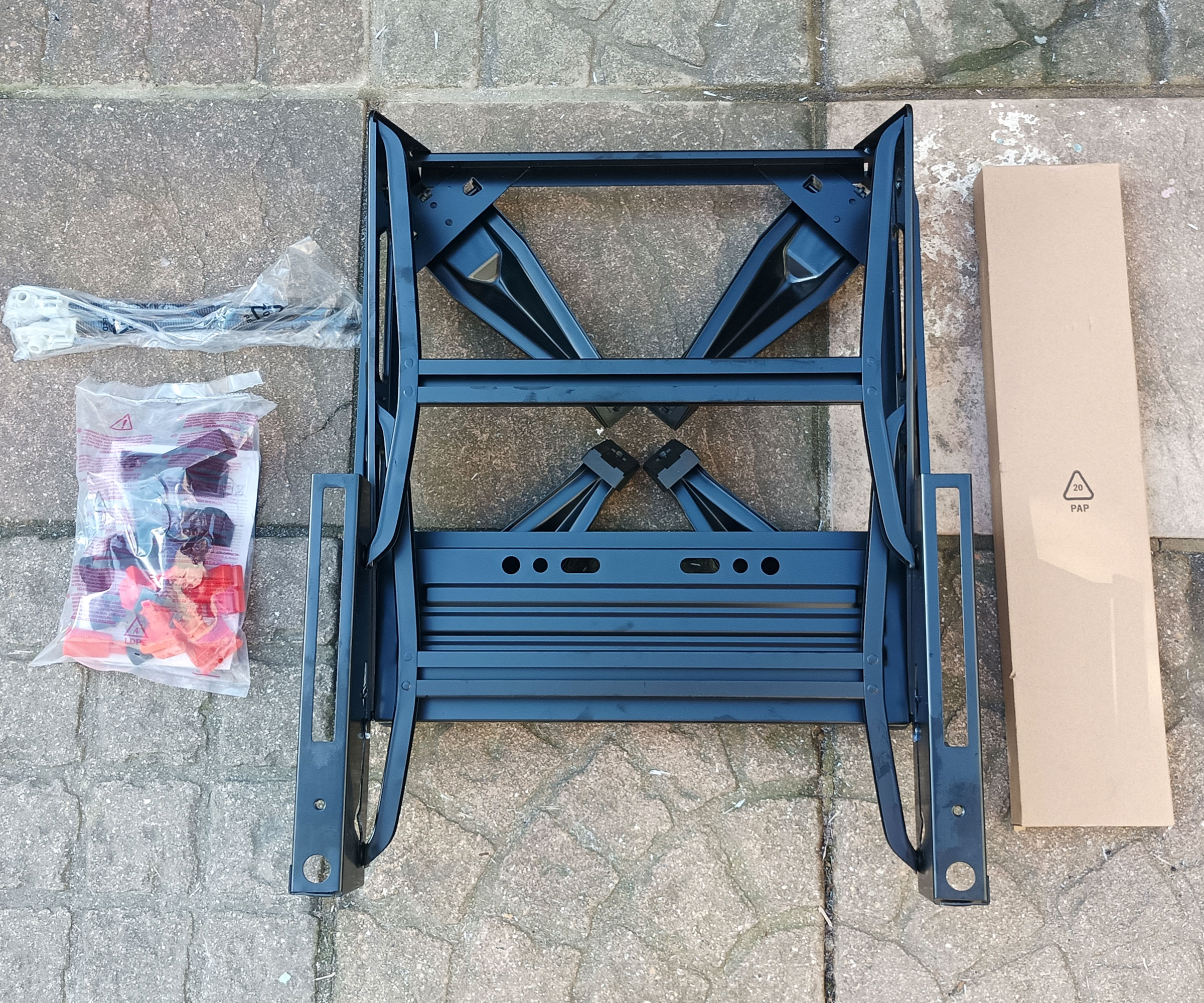 Black &amp;amp; Decker Workmate WM536 unassembled laying on patio