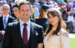 Actor Patrick J. Adams and wife Troian Bellisario arrive at St George's Chapel at Windsor Castle