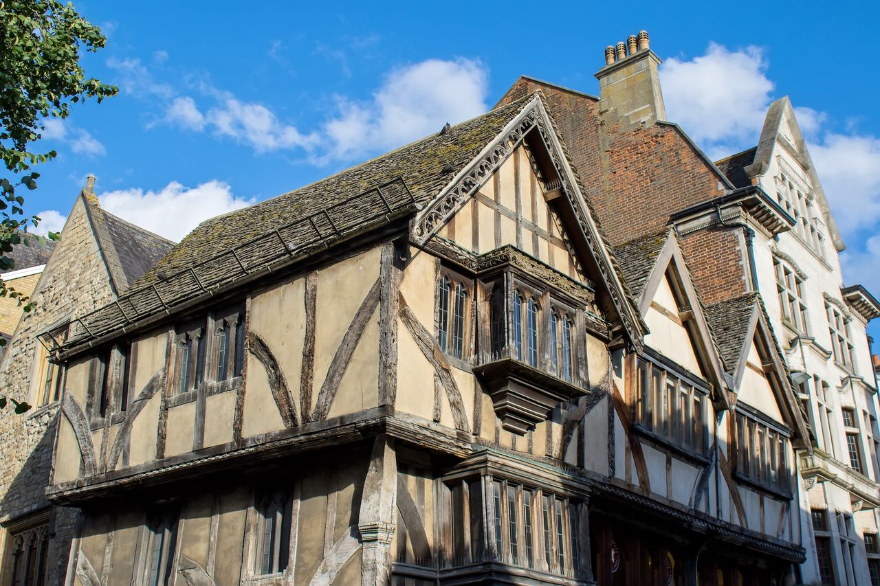tudor style house with jetty bay window