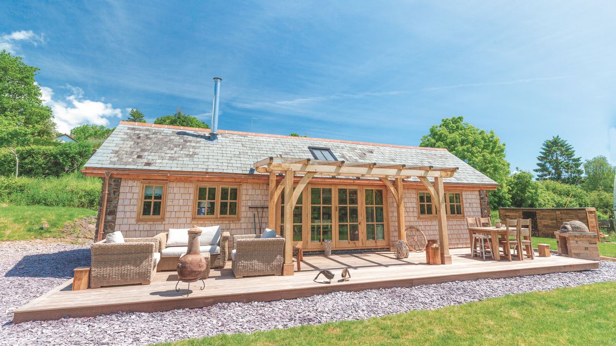 timber clad barn conversion with decking