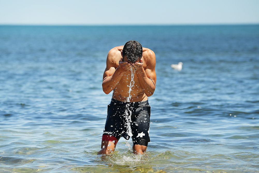 Richie Porte (BMC Racing) cools off in the ocean after stage three of the 2018 Tour Down Under