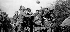 FIRST WORLD WAR ARMISTICE November 1918. British soldiers in France celebrate the signing of the Armistice