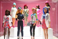 Collection of Barbie dolls on display in an exhibition in London