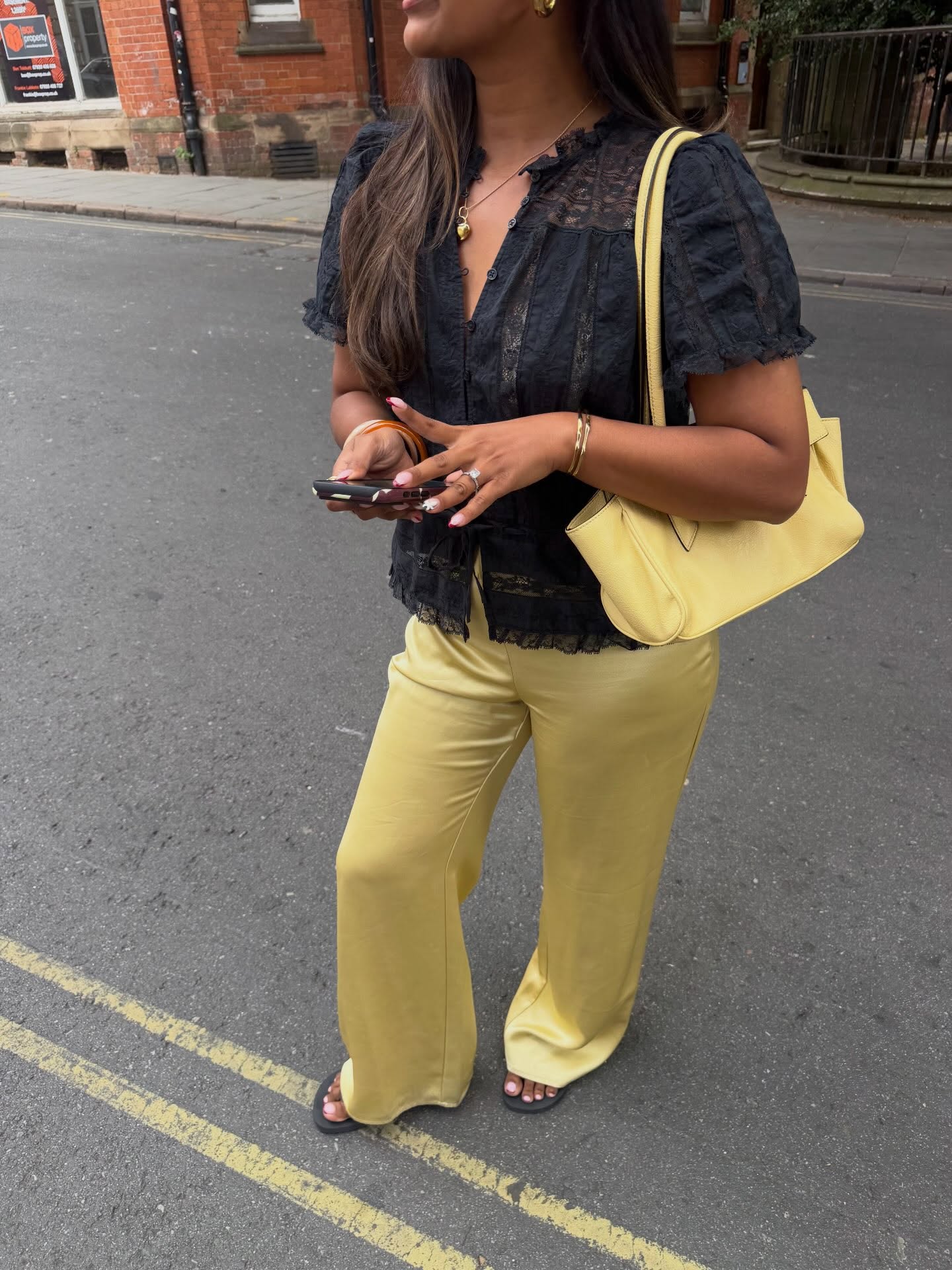An image of a woman wearing early fall trendy outfit idea 2026