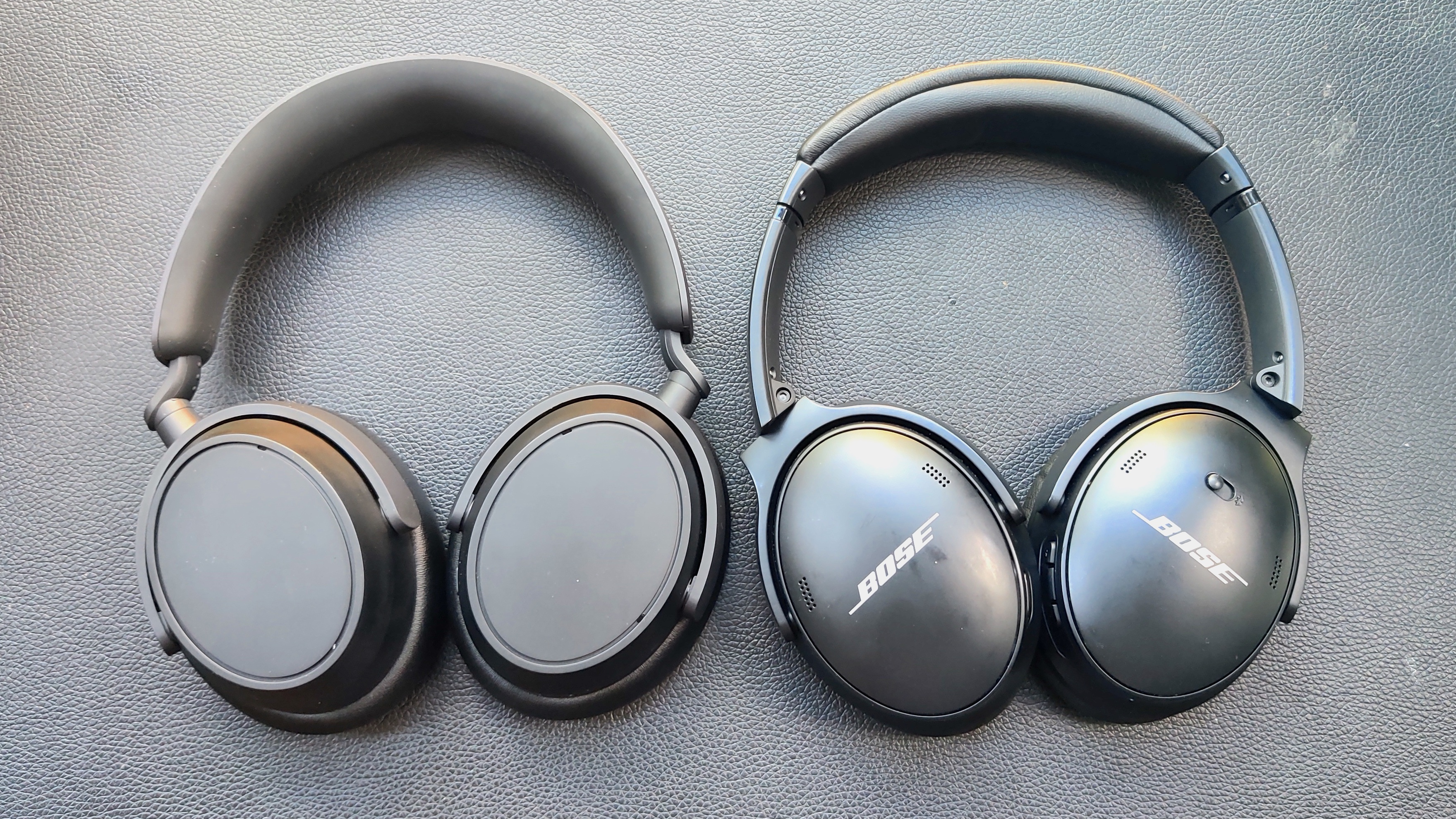 Sennheiser Accentum Plus and Bose QC 45 headphones side by side