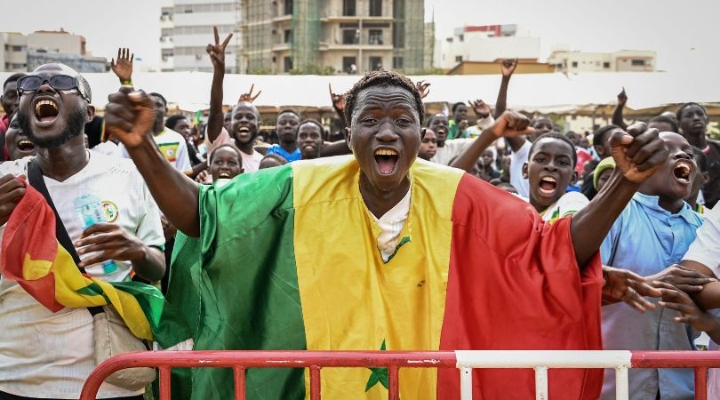 Senegal fans celebrate their World Cup victory over Qatar in Dakar.