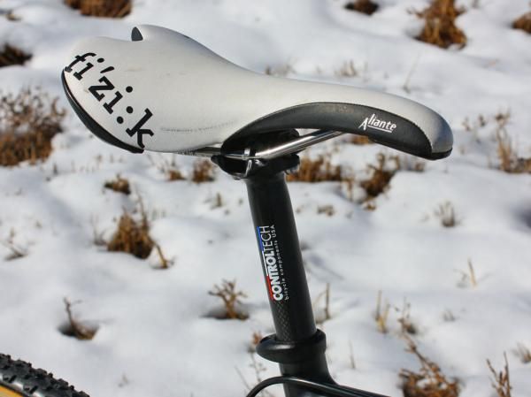 The fi'zi:k Aliante saddle is a popular choice among 'cross racers for its generous flex pattern and ample support.