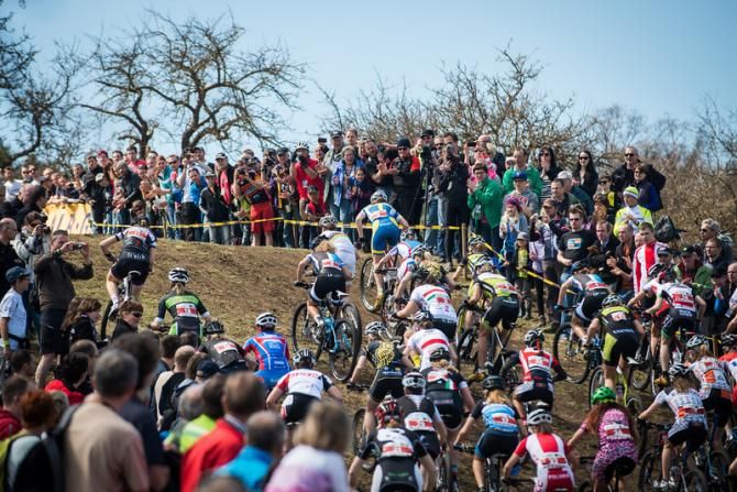 The elite women push the pace up an early hill