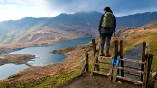 Hiker climbing Yr Wyddfa, Wales