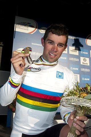Michael Matthews of Australia celebrates with his gold medal after winning the men's under 23 road race in Geelong.