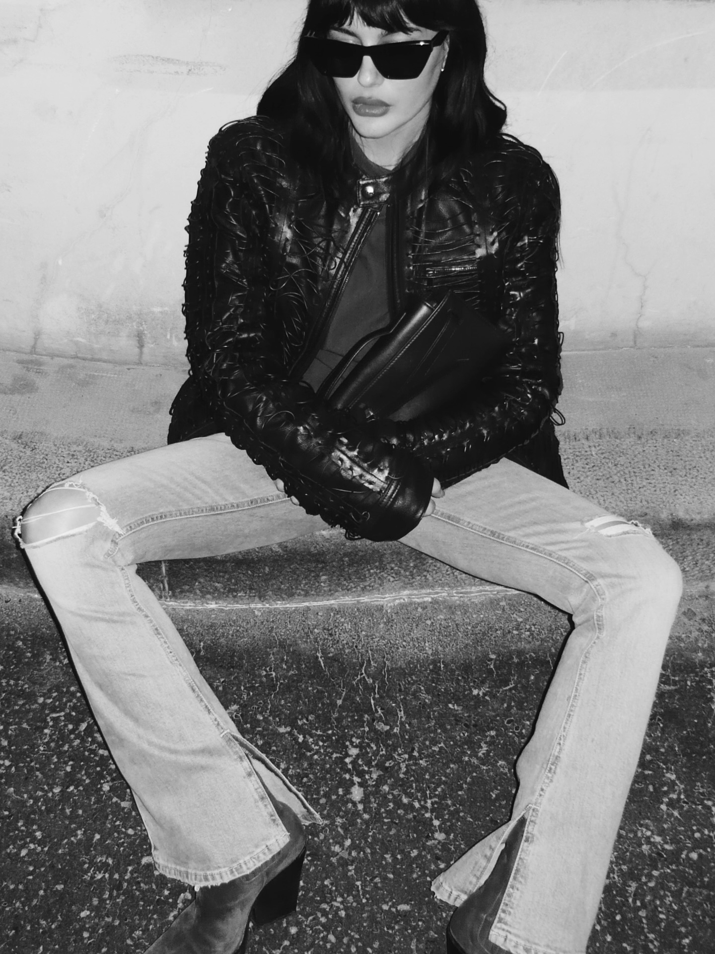 Fashion person wearing bootcut jeans.